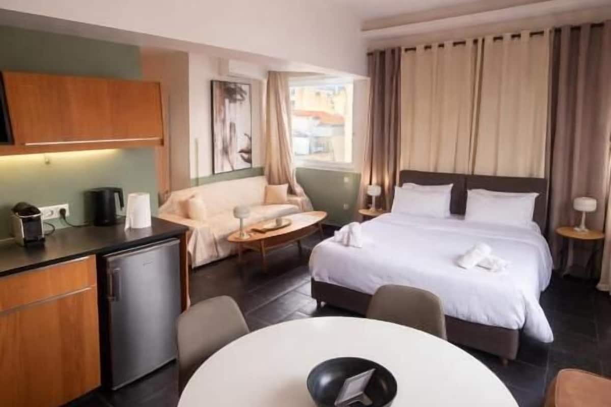 Suite Elite, 1 letto king, non fumatori (502) | Copriletto in piuma, una cassaforte in camera, tende oscuranti