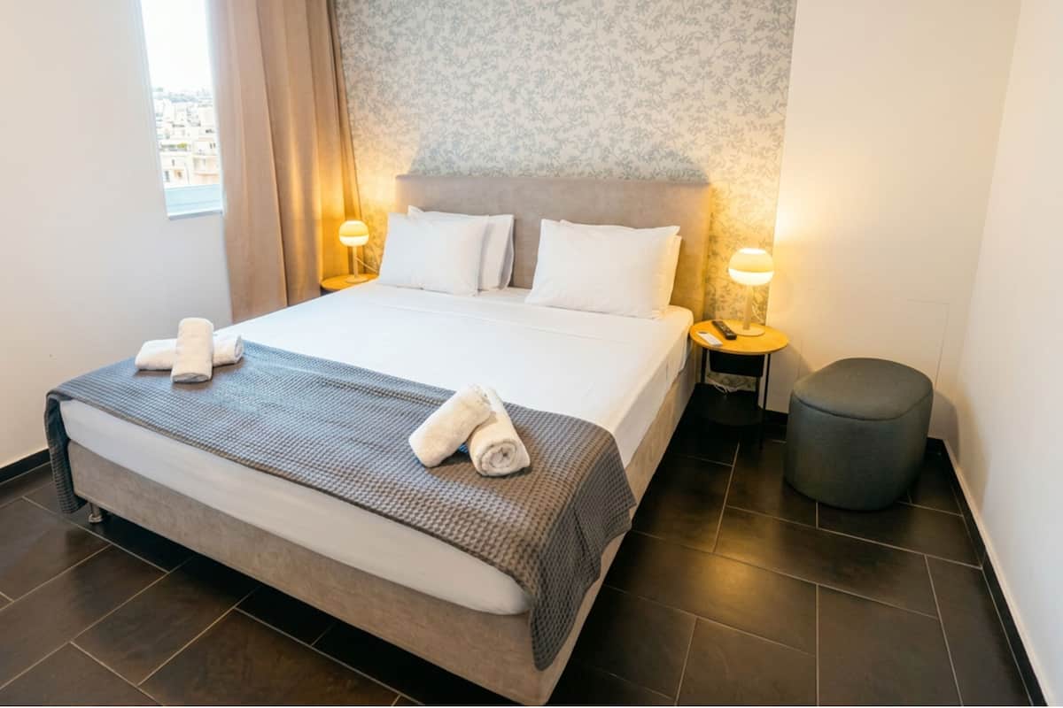 Junior Suite, 1 King Bed, Non Smoking (501) | Down comforters, in-room safe, blackout drapes, soundproofing