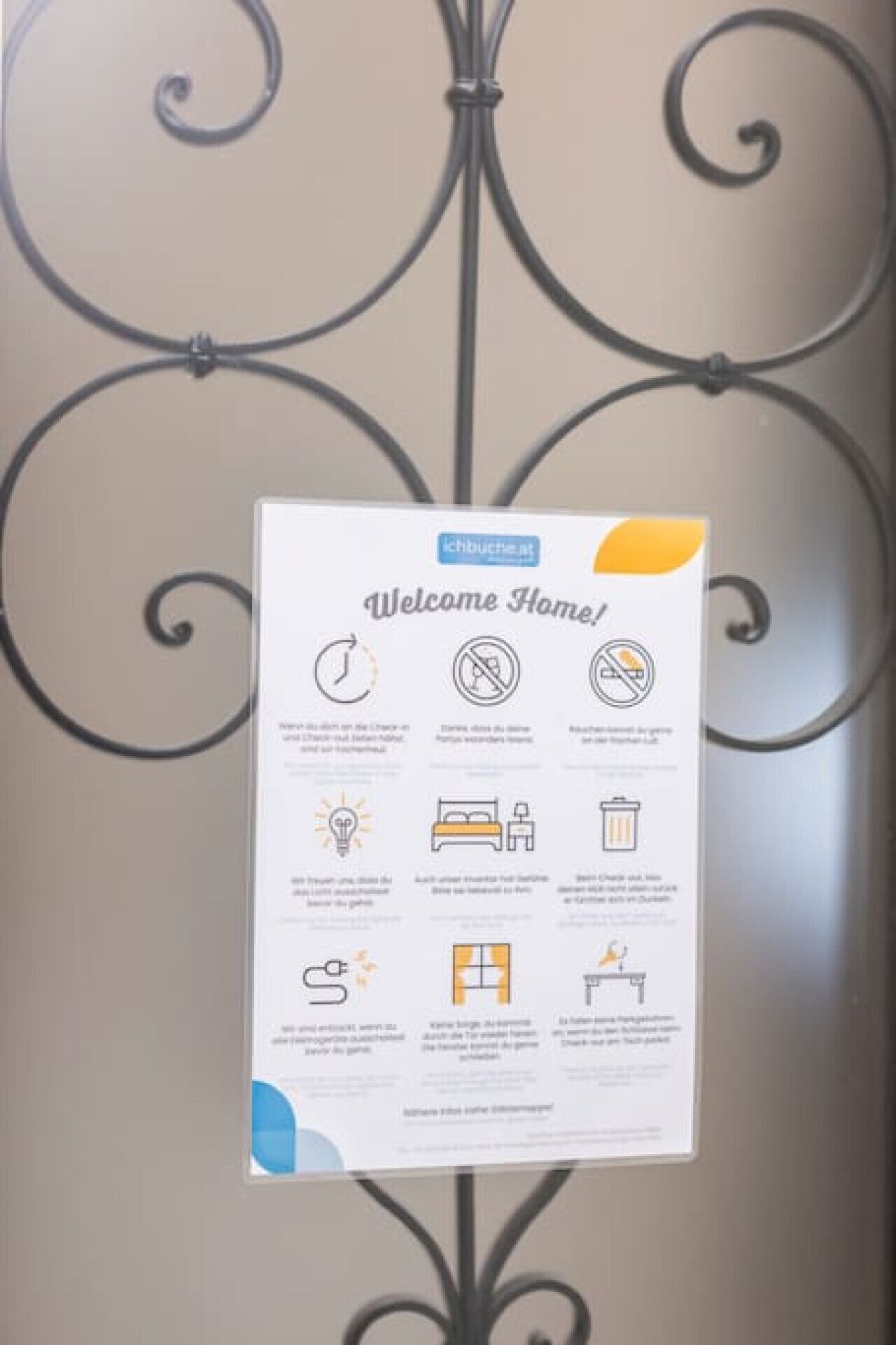 A welcome sign with various icons and text, likely providing information about hotel amenities and rules.