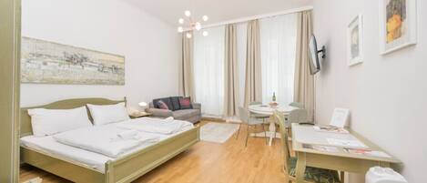 1 bedroom, desk, iron/ironing board, travel crib