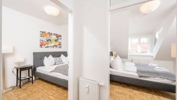 2 dormitorios, tabla de planchar con plancha, cuna de viaje y wifi