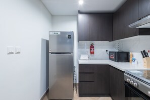 Appartement Confort | Cuisine privée | Réfrigérateur, micro-ondes, four, grille-pain