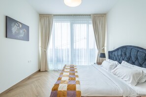 Appartement Confort | 1 chambre, décoration personnalisée, fer et planche à repasser