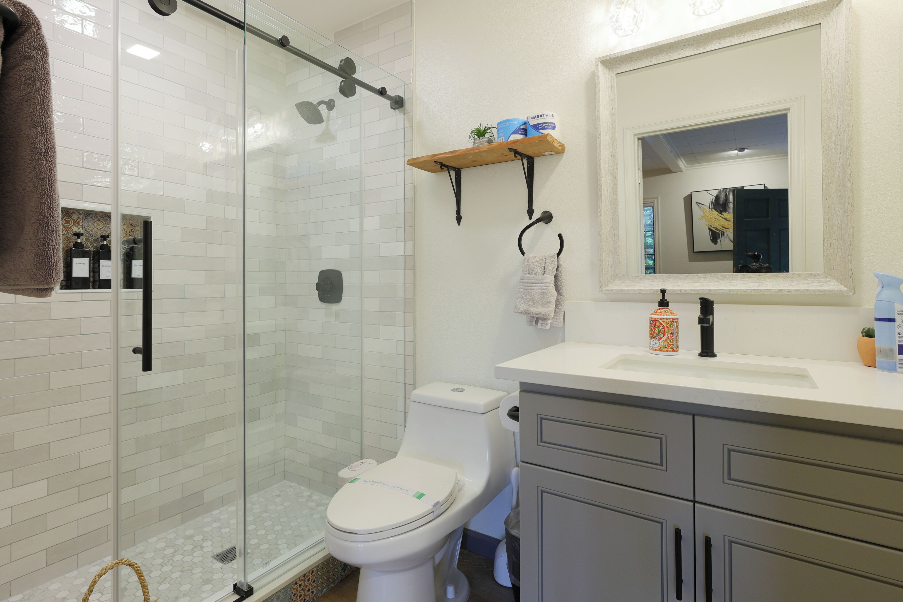 Hair dryer, towels, soap, shampoo