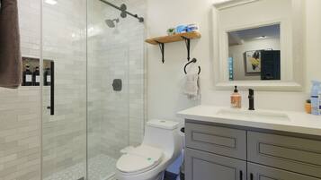 Hair dryer, towels, soap, shampoo