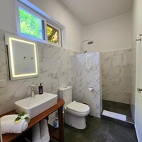 Standard Triple Room, Multiple Beds | Bathroom | Shower, rainfall showerhead, hair dryer, towels