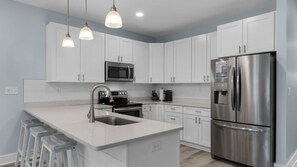 Fridge, microwave, oven, stovetop - 3BR Townhouse, Beach, Spacious Deck + Free Tickets: Dolphin Cruise & More! (Panama City Beach)