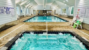 An indoor swimming pool with two lanes, marked depth indicators, and safety signs on the walls. - 197 Georges Bay Road (Margonitaville) (Surfside Beach)