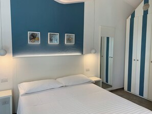 1 dormitorio, tabla de planchar con plancha, wifi gratis y ropa de cama