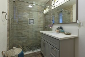 Hair dryer, towels, soap, shampoo