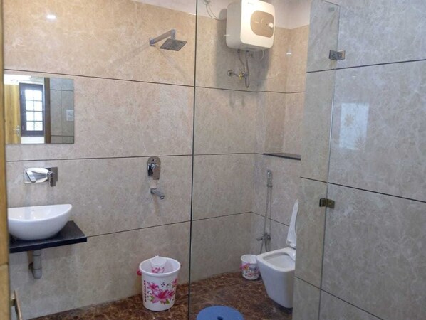 Shower, towels, soap, shampoo