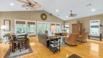 House | Living area | 65-inch Smart TV with digital channels, Netflix, Hulu