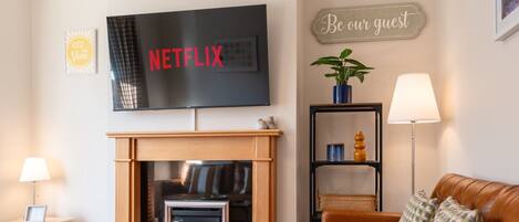 Televisión, chimenea