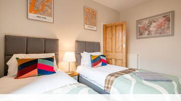 3 bedrooms, desk, iron/ironing board, travel cot