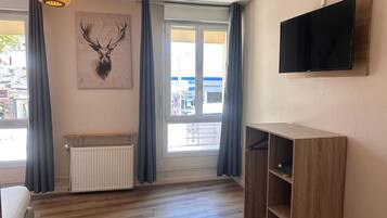 Premium bedding, desk, laptop workspace, WiFi (free)