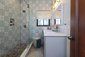 Hair dryer, towels, soap, shampoo