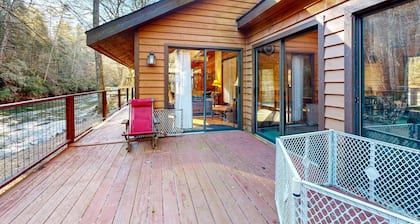 Dog-friendly, riverfront retreat with game room, washer/dryer, wraparound deck