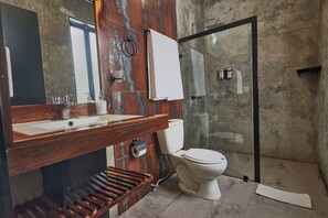 Habitación Deluxe | Baño | Tina y toallas 