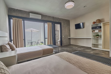 Family Room | 1 bedroom, in-room safe, individually decorated, desk