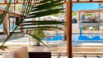 2 outdoor pools, pool umbrellas, sun loungers