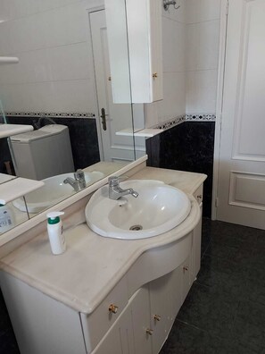 Hair dryer, bidet, towels, toilet paper