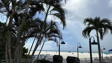 On the beach, sun loungers, beach towels