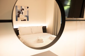 Habitación estándar | Ropa de cama de alta calidad y edredones de plumas