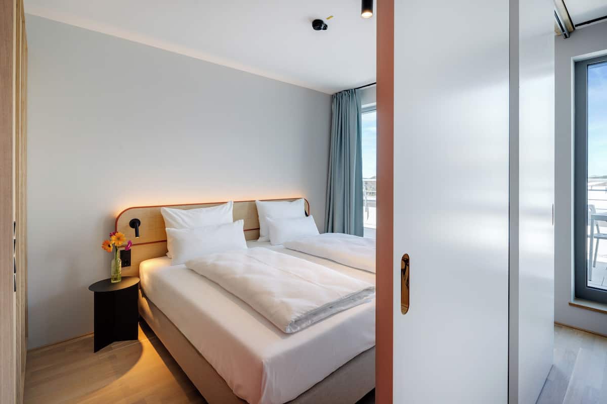 Suite estudio panorámica | 1 dormitorio, caja fuerte, cortinas opacas y sistema de insonorización