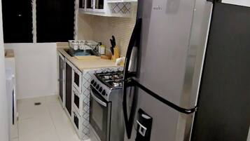Fridge, microwave, coffee/tea maker, electric kettle