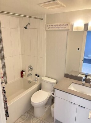 Hair dryer, towels, soap, shampoo