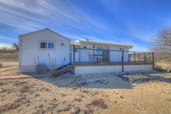 A single-story house with a covered patio area.