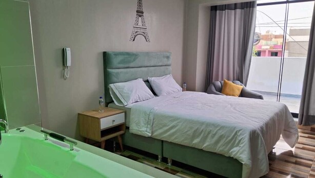 Premium bedding, down duvets, in-room safe, free WiFi - BLISS INN (Callao)