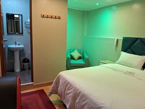 Familiekamer | Luxe beddengoed, donsdekens, een kluis op de kamer, gratis wifi