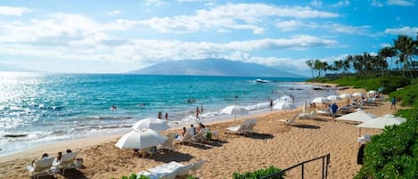 On the beach, sun-loungers, beach towels