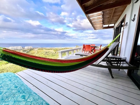 Outdoor dining. Ocean view romantic getaway chalet