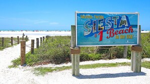 A beach sign with the text "Sarasota, Florida #1 Beach in the USA!" - Relax & Explore – Sarasota Beaches & Downtown! (Sarasota)
