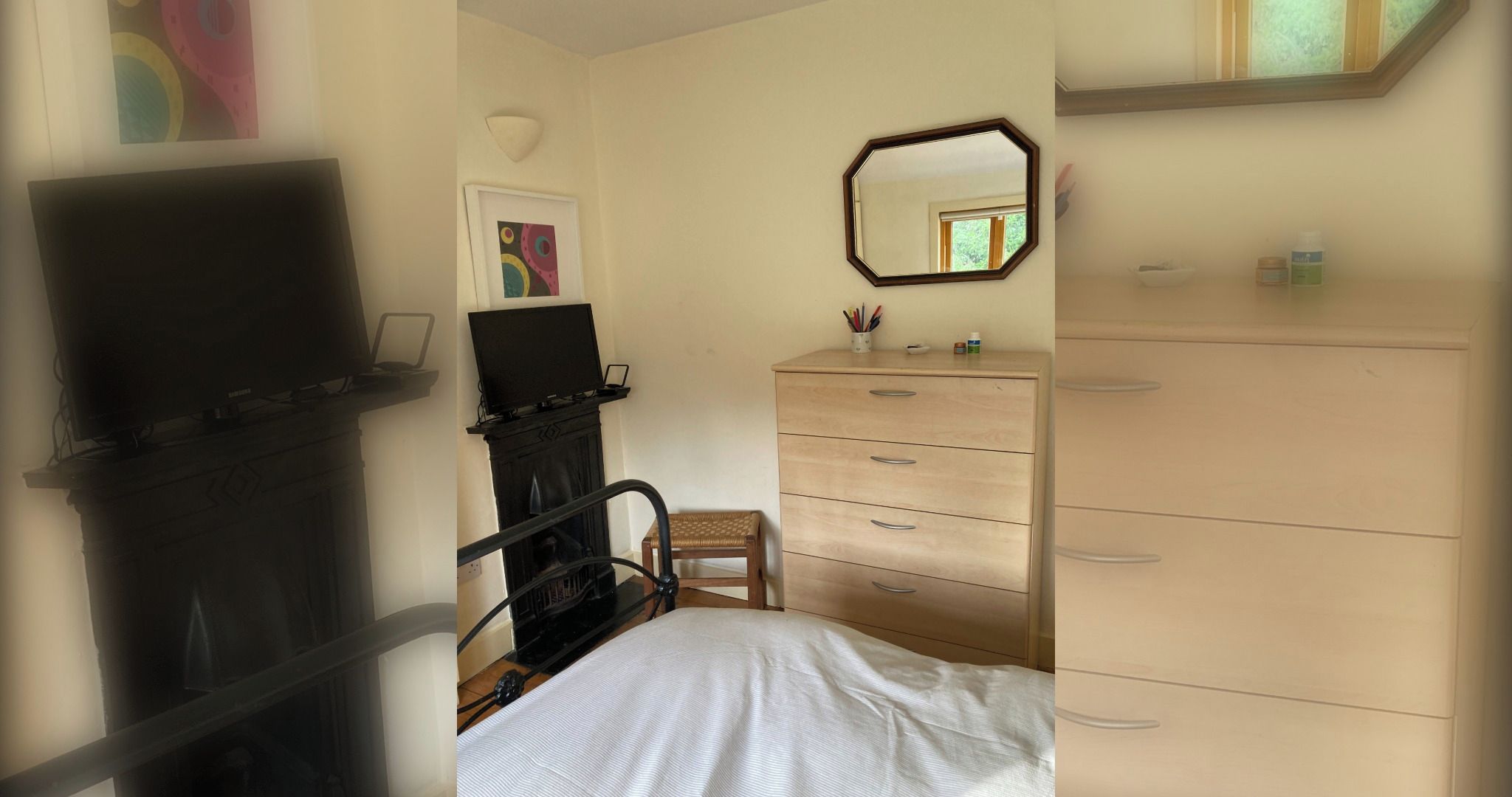 A bedroom with a bed, a dresser, a chair, and a TV.