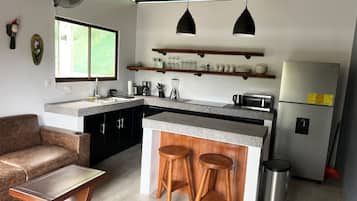 Basic Villa | Private kitchen | Full-sized fridge, microwave, oven, toaster