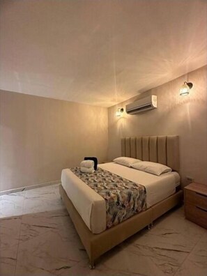 1 غرفة نوم وواي فاي وملاءات أسرّة