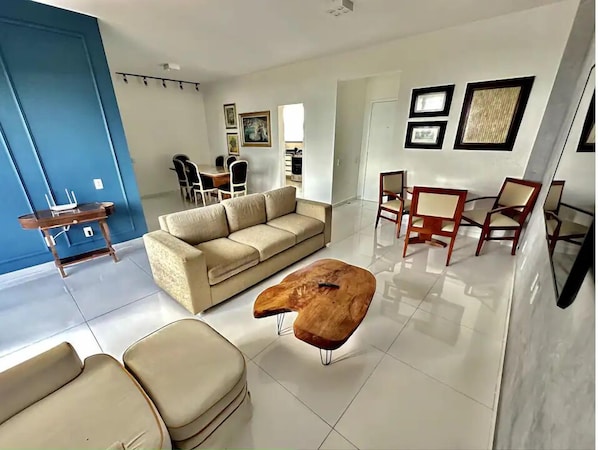 Superior Apartment | Living area | 32-inch Smart TV with digital channels, pay movies