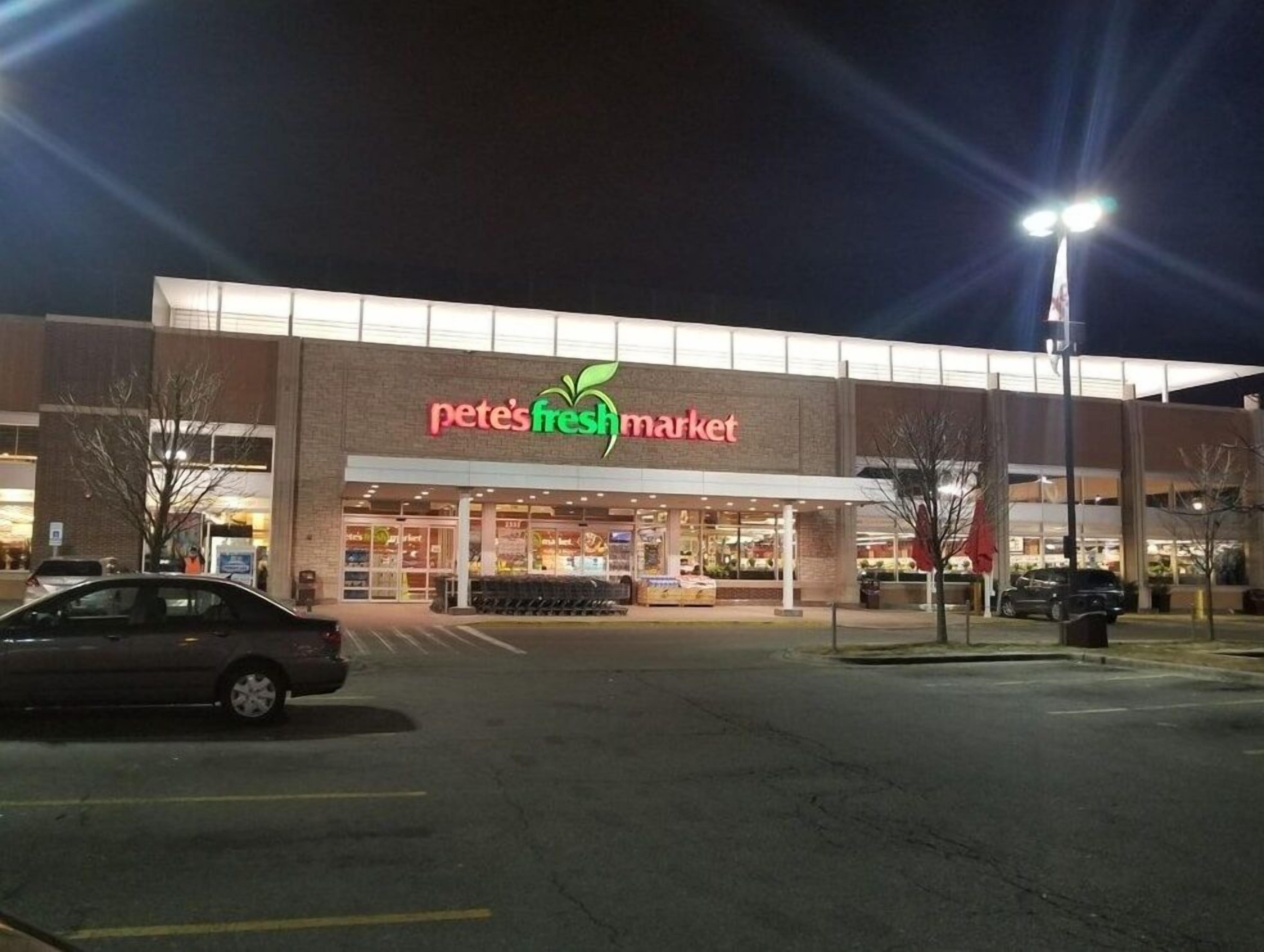 A large, well-lit building with a prominent sign reading "Pete's Fresh Market."