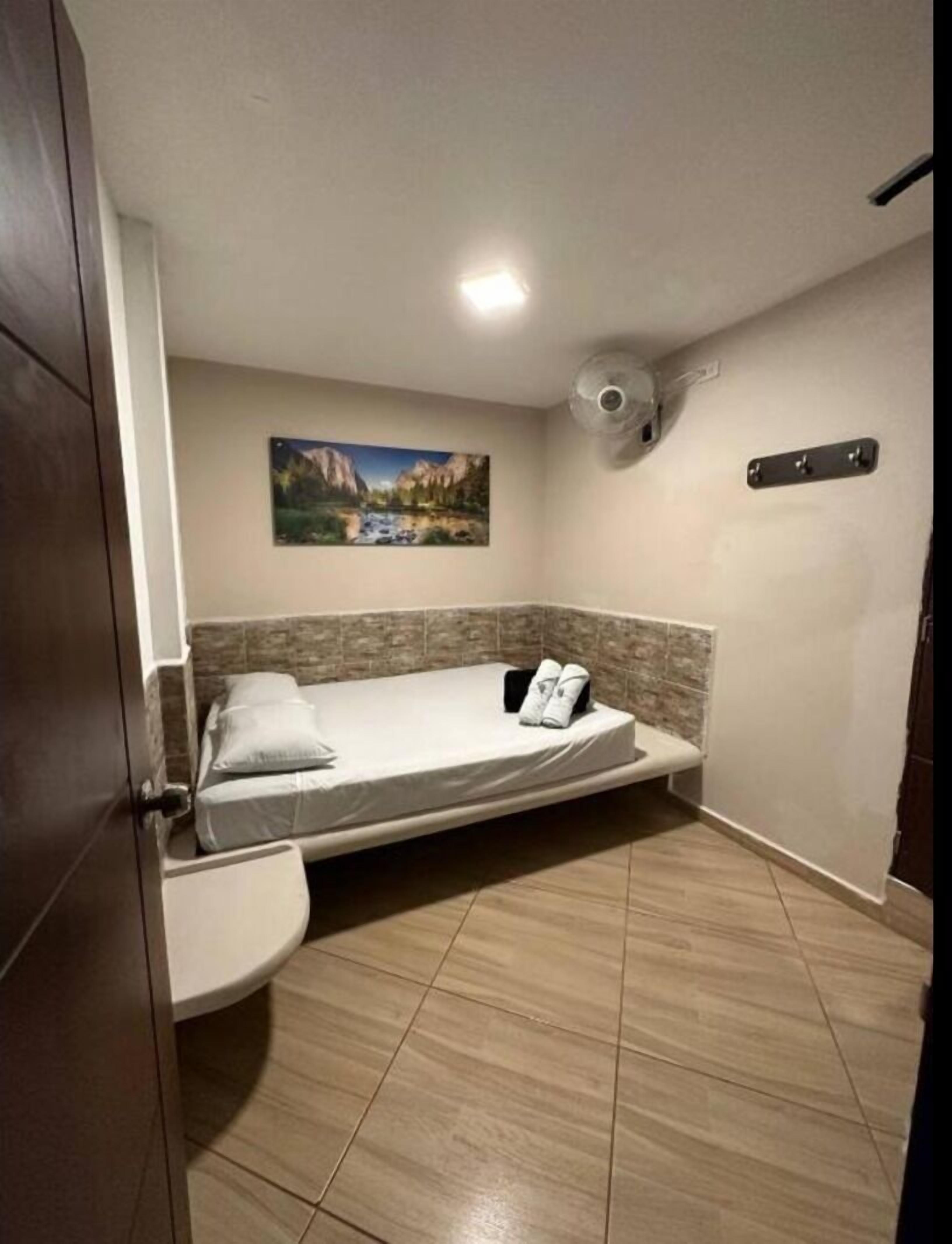 1 غرفة نوم وواي فاي وملاءات أسرّة