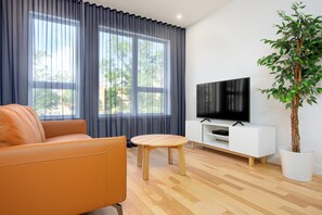 Loft | Area keluarga | Televisi layar datar 50-inci dengan saluran TV digital