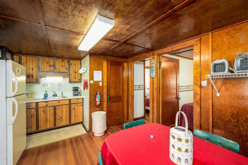 Fridge, microwave, coffee/tea maker, cookware/dishes/utensils