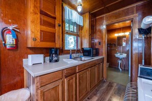 Fridge, microwave, cookware/dishes/utensils, dining tables - Stunning Lake Sunsets and Quiet Getaway here at Stiefvater's Lakeside Cottages! (Inlet)