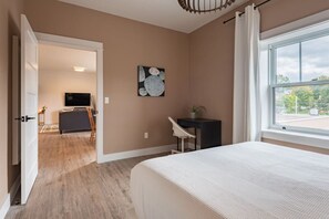 1 bedroom, desk, iron/ironing board, travel crib