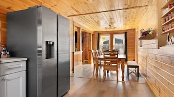 Kitchen with full-size fridge