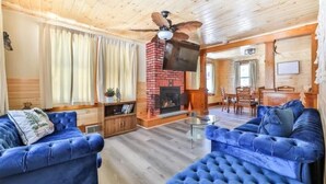 Smart TV, fireplace, foosball, books