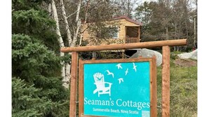 A sign for Seaman's Cottages in Summerville Beach, Nova Scotia.