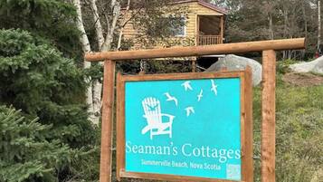 A sign for Seaman's Cottages in Summerville Beach, Nova Scotia.
